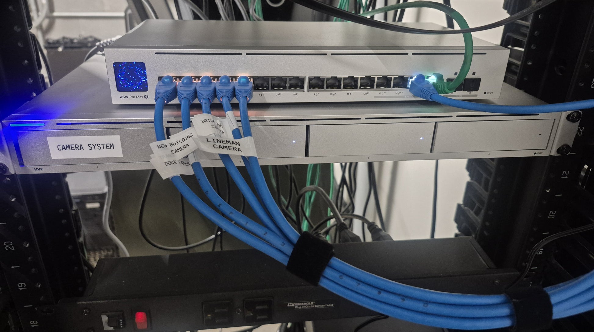 Network video recorder rack with labeled camera cabling
